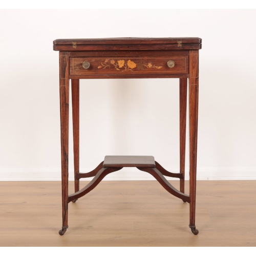 43 - AN EDWARDIAN ROSEWOOD AND MARQUETRY ENVELOPE CARD TABLE the four leaves folding outward to reveal a ... 