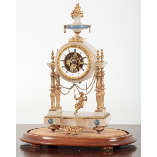 44 - A FRENCH ONYX AND GILT METAL MOUNTED 'SWINGING MAIDEN' MANTEL CLOCK, STAMPED FARCOT A PARIS the sing... 