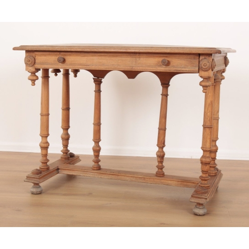 47 - A VICTORIAN ELM SIDE TABLE the moulded top edge over a single drawer to one side, turned paterae aff... 