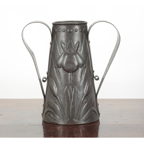 49 - A NEWLYN COPPER TWIN HANDLED VASE stamped to the base, of tapered conical form, repousse decorated w... 