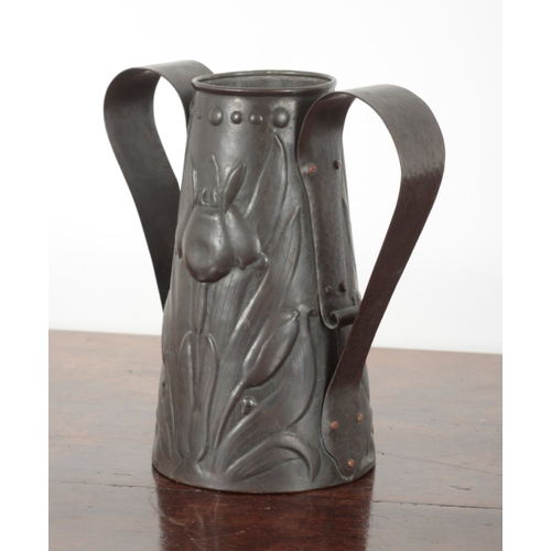 49 - A NEWLYN COPPER TWIN HANDLED VASE stamped to the base, of tapered conical form, repousse decorated w... 