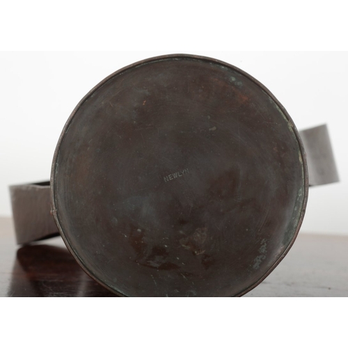 49 - A NEWLYN COPPER TWIN HANDLED VASE stamped to the base, of tapered conical form, repousse decorated w... 