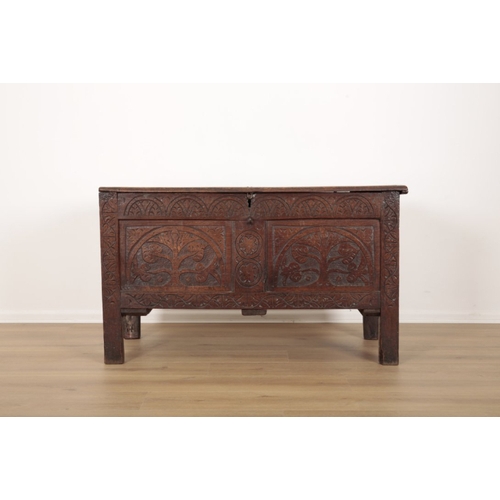5 - A 17TH CENTURY OAK COFFER the hinged lid opening to an interior fitted with a small box to one side,... 
