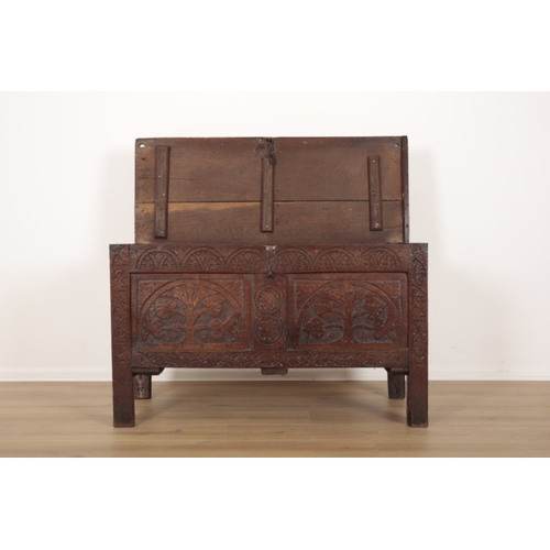5 - A 17TH CENTURY OAK COFFER the hinged lid opening to an interior fitted with a small box to one side,... 