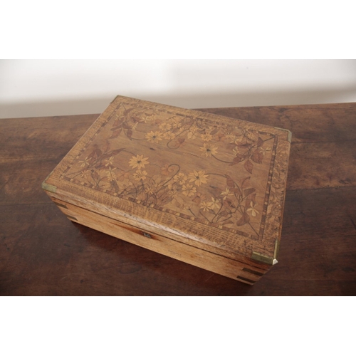 54 - AN OAK AND MARQUETRY CUTLERY BOX BY WIDDOWSON & VEALE the hinged lid inlaid with flowers opens to a ... 