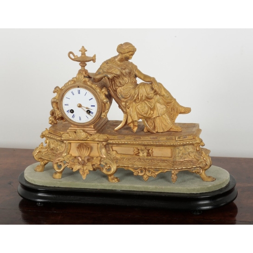 6 - A FRENCH GILT SPELTER MANTEL CLOCK 19th century, the two train movement striking on a bell, the back... 