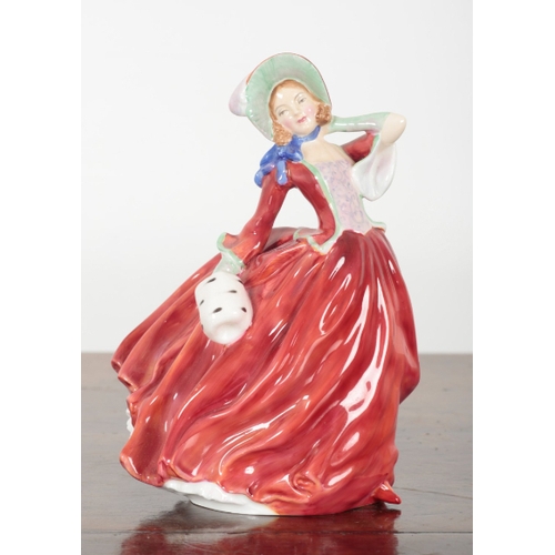 7 - THREE ROYAL DOULTON PORCELAIN FIGURES Belle of the Ball, 15cm high, Autumn Breezes, 20cm high, and T... 