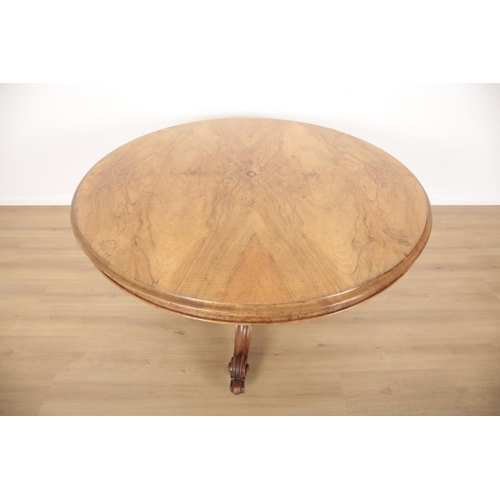 70 - A VICTORIAN WALNUT AND BURR WALNUT BREAKFAST TABLE the quarter veneered tilt top on a turned and gad... 