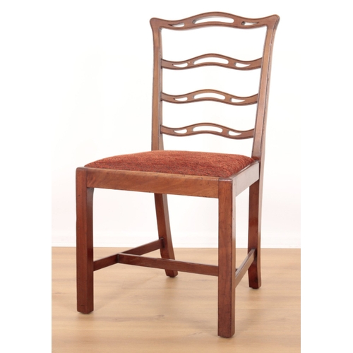 74 - A GROUP OF FOUR GEORGE III STYLE MAHOGANY DINING CHAIRS with pierced ladder-back splats over square ... 