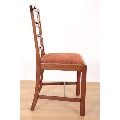 74 - A GROUP OF FOUR GEORGE III STYLE MAHOGANY DINING CHAIRS with pierced ladder-back splats over square ... 