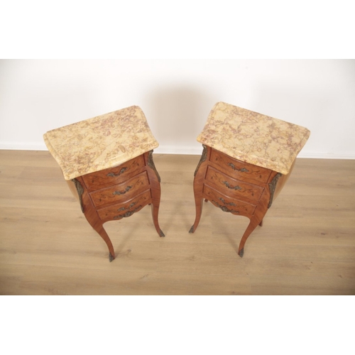79 - A PAIR OF LOUIS XV STYLE MARBLE TOP BEDSIDE CHEST OF DRAWERS of bombe form, the three drawers inlaid... 