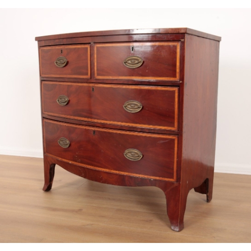 88 - A GEORGE III MAHOGANY AND SATINWOOD CROSSBANDED BOW FRONT CHEST OF DRAWERS the two short drawers and... 
