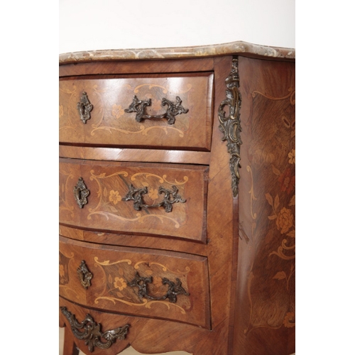 98 - A LOUIS XV STYLE MARBLE TOPPED SERPENTINE COMMODE the three drawers and the sides inlaid with foliat... 