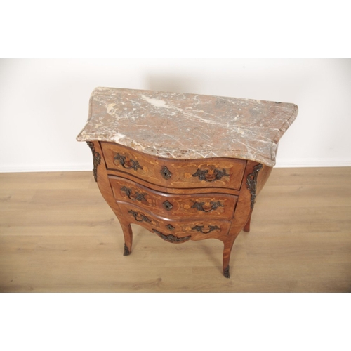 98 - A LOUIS XV STYLE MARBLE TOPPED SERPENTINE COMMODE the three drawers and the sides inlaid with foliat... 