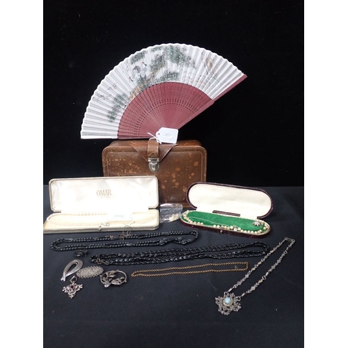 438 - A CASED SIMULATED PEARL NECKLACE with a leather box containing a collection of costume jewellery and... 