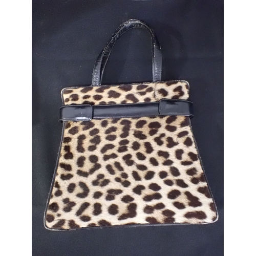 90 - THREE FUR STOLES AND A LEOPARD SKIN HANDBAG