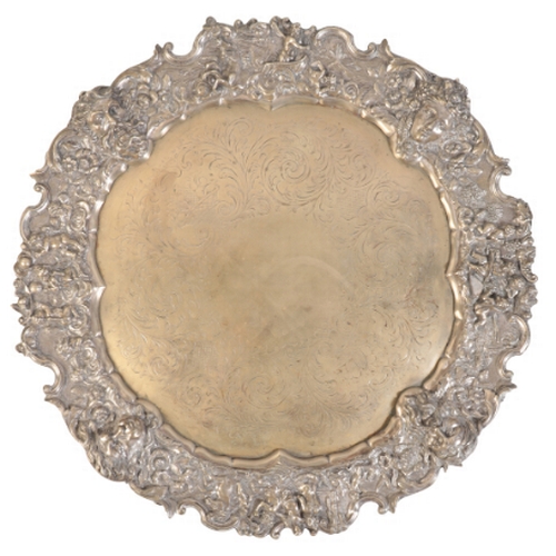 232 - 'THE APCAR PLATE' an impressive late 19th Century silver plated salver, boldly cast in relief with f... 