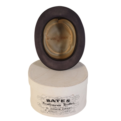 251 - BATES, LONDON: A GENTLEMAN'S PURPLE BOWLER HAT in the original Bates cardboard hat box

Provenance: ... 