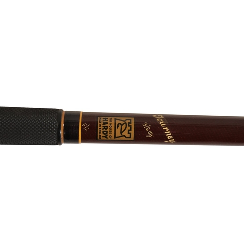 77 - HARDY BROS: A TOURNEY BEACHCASTER TWO PIECE CARBON ROD in the original Hardy canvas rod bag