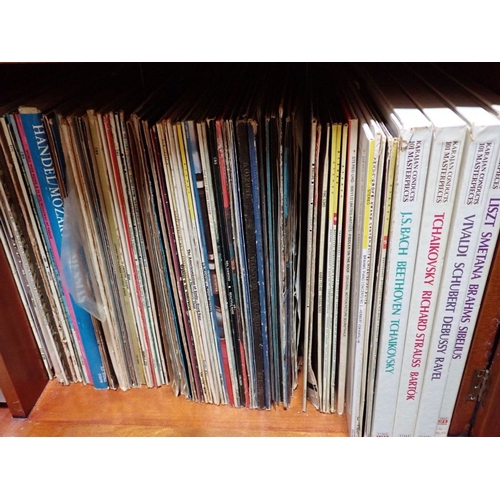 138 - AN ONKYO HI-FI SYSTEM, AND A QUANTITY OF LP RECORDS and tapes, in a reproduction cabinet