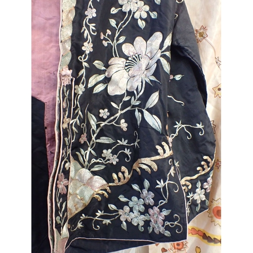 152 - AN EMBROIDERED CHINESE JACKET with two Malaysian silk suits