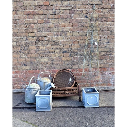 16 - A FIRE BASKET, TWO GALVANISED WATERING CANS (rounded bottoms), faux-lead planters, garden sieves and... 