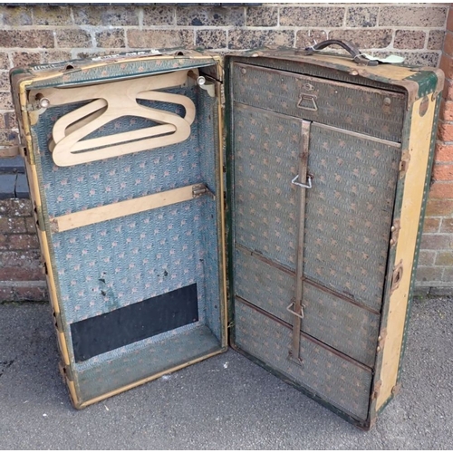 180 - A CABIN WARDROBE TRUNK, CUNARD WHITE STAR LABELS for 'Mauretania', with fitted interior; 'Neverbreak... 