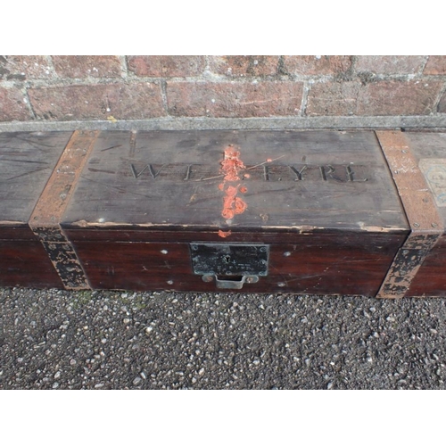 190 - AN ANTIQUE STAINED PINE FISHING ROD BOX metal bound, marked 'W.E. EYRE' 198cm long (handle a/f)