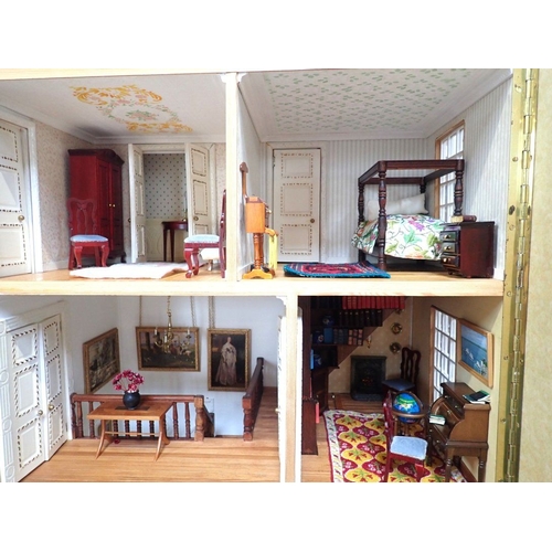 228 - A LARGE FULLY FURNISHED FOUR-STOREY DOLLS HOUSE in the style of a 19th century town house, three flo... 