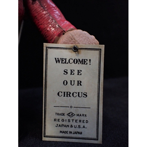 257 - A CELLULOID JAPANESE ELEPHANT with label 'Welcome see our Circus' (damaged to arm fixing) and two St... 