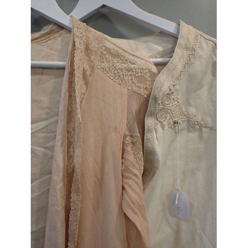 26 - A PEACH CHIFFON AND SILK ROBE with a white embroidered and pin tucked negligee and robe and a Arabic... 