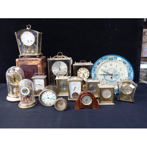 303 - A LARGE LEATHER CARRIAGE CLOCK CASE (a/f), and various clocks and movements (a/f)