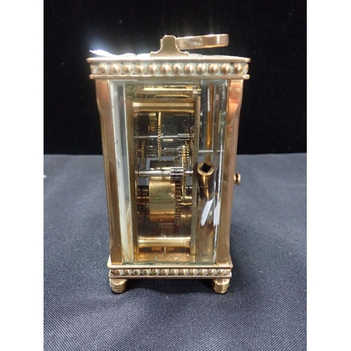 304 - A CARRIAGE CLOCK BY DE LA GRENSE, OXFORD with beaded borders (with key, running)