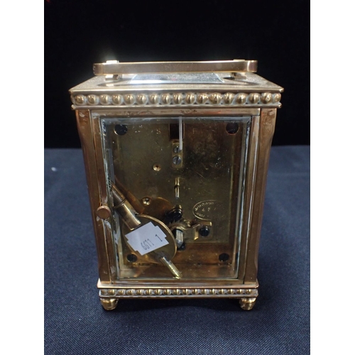 304 - A CARRIAGE CLOCK BY DE LA GRENSE, OXFORD with beaded borders (with key, running)