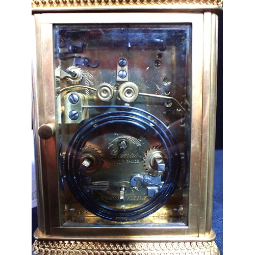 306 - A BRASS-CASED FRENCH CARRIAGE CLOCK, WITH REPEAT AND ALARM on a gong, with engraved dial and decorat... 