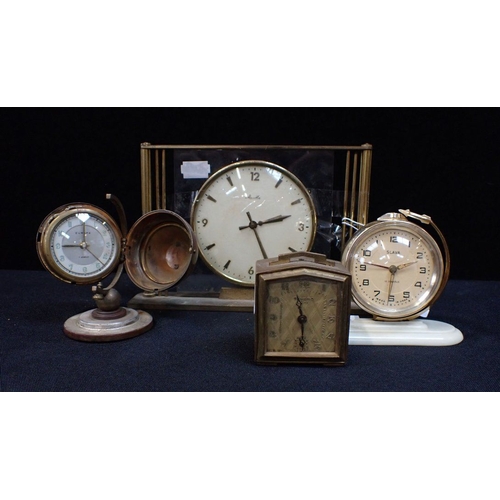 307 - A U.S.S.R SLAVA SPUTNIK CLOCK together with a Bayard travelling clock, a Europa globe clock and a ma... 