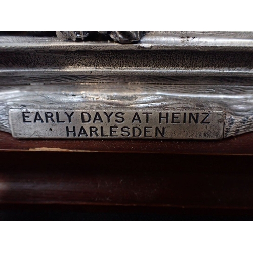 81 - A PEWTER MODEL, 'EARLY DAYS AT HEINZ: HARLESDEN' together with three pewter mugs