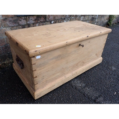 914 - A SMALL 19TH CENTURY STRIPPED PINE TRUNK later fitted with lift-out trays 74cm wide