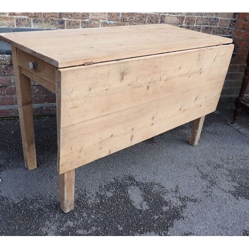 915 - A 19TH CENTURY STRIPPED PINE KITCHEN TABLE with single drop flap, on square legs, with a single draw... 