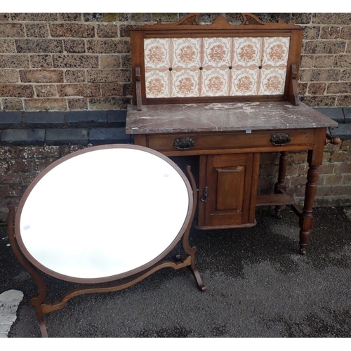 916 - A LATE VICTORIAN WASHSTAND WITH ROUGE MARBLE TOP and transfer-printed tile splashback 92cm wide (plu... 