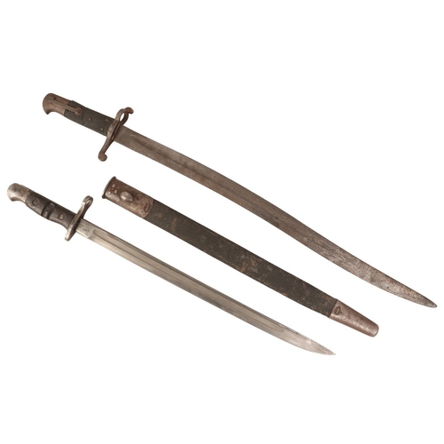 169 - TWO BAYONETS

an American Remington Bayonet dated 1918, in average condition; together with an 1856 ... 