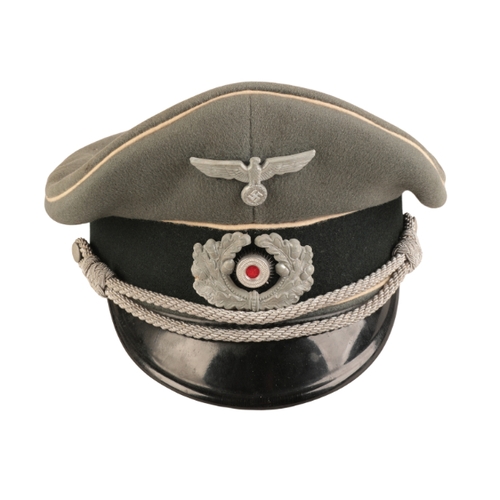 212 - A WWII GERMAN INFANTRY OFFICER'S VISOR

an excellent example, complete with Eagle and Cockade and bu... 