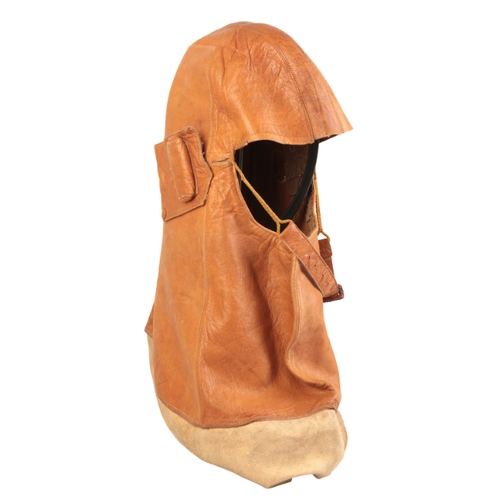 216 - A TAN LEATHER FLYING HELMET

in the style of the Royal Flying Corps, leather is supple and in very g... 