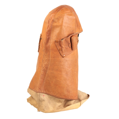 216 - A TAN LEATHER FLYING HELMET

in the style of the Royal Flying Corps, leather is supple and in very g... 