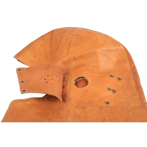 216 - A TAN LEATHER FLYING HELMET

in the style of the Royal Flying Corps, leather is supple and in very g... 