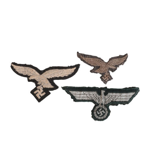 231 - THREE THIRD REICH CLOTH EAGLES

an Army example on green backing for a dress uniform, looks to be re... 