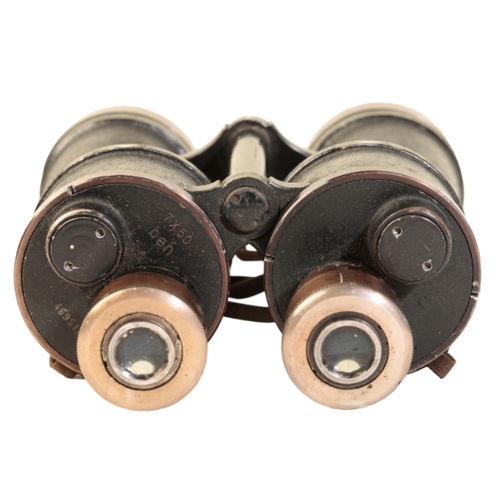 233 - A PAIR OF 7 X 50 BINOCULARS

the backplate stamped with makers code DEH no. 469510, with a leather n... 