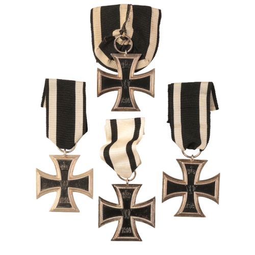 43 - FOUR 1914 IRON CROSSES 2ND CLASS

all with three-piece construction, the first with ring stamped wit... 