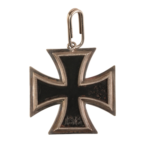 52 - A FIELD CONVERSION KNIGHTS CROSS

1939 Iron Cross 2nd Class, three-piece construction, suspension lo... 