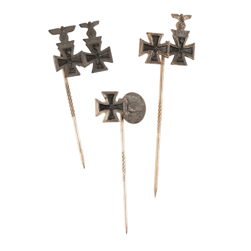 62 - THREE THIRD REICH STICK PINS

an Iron Cross and Silver Wound Badge; together with a 1914 Iron Cross ... 